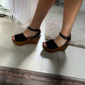 Black suede platform shoes